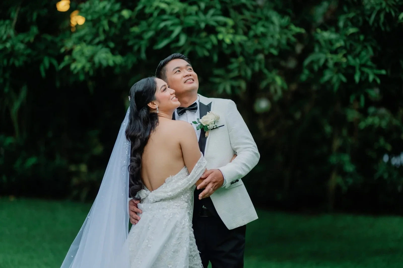 Newlyweds embracing, Diamond wedding package at Savanna Farm Tagaytay